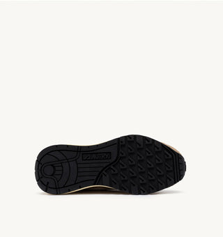 Autry Reelwind Low sneakers in pepper and white with suede and nylon upper, retro runner silhouette and white cushioned sole.