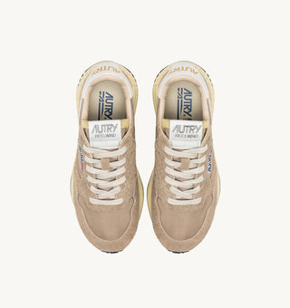 Autry Reelwind Low sneakers in pepper and white with suede and nylon upper, retro runner silhouette and white cushioned sole.