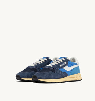 Autry Reelwind Low sneakers in bluette and digital blue nylon and suede with white leather side panels and retro runner sole.