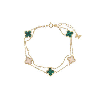 Gold bracelet with green and pink butterfly-shaped charms on a white background