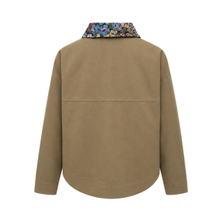 A tan long-sleeve overshirt shown from the back, featuring a colorful floral patterned collar on a solid white background.