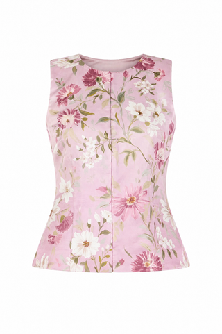 Pink sleeveless top with floral pattern on a white background