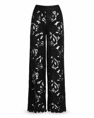Black lace pants with white floral patterns on a white background