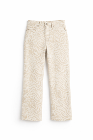 LE JEAN Nomad Ankle Mid Rise Jean in Zebra white jeans with zebra pattern