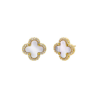 Pair of gold earrings with white center on a white background