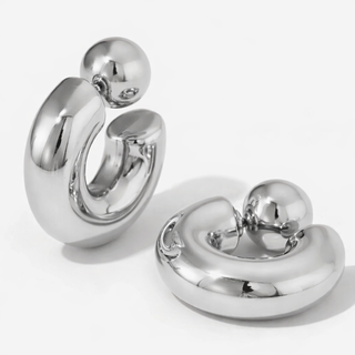 Pair of silver hoop earrings on a white background