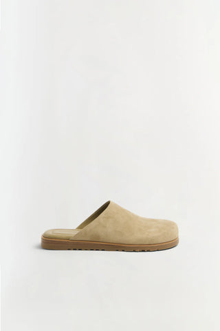 Beige slipper on a white background