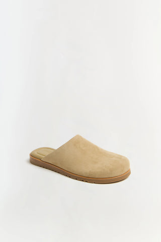 Beige slipper on a white background