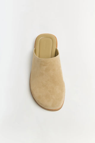 Beige slipper on a white background