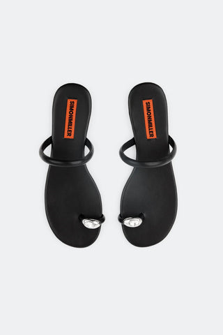 Black sandals with a brand logo on a white background