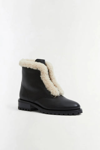 SIMKHAI Noah Shearling Lug Sole Zip Boot in Black Ecru