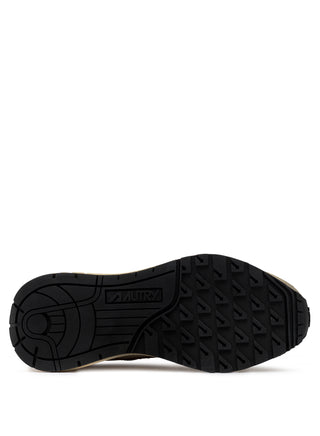 Women’s Autry Reelwind sneakers in rose suede and nylon with brown leather side accents, washed finish, and retro runner sole with star tread.