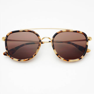Sunglasses with tortoiseshell frame and brown lenses on a white background