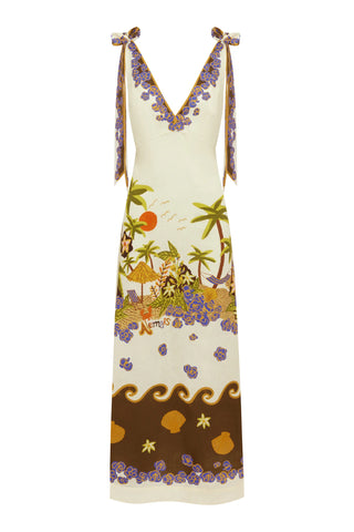 A sleeveless V-neck maxi dress with tie-shoulder straps, featuring a cream base with a tropical beach print in purple, green, brown, and orange, and a wavy brown border at the hem.
