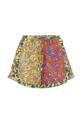 Multicolored patterned shorts on a white background