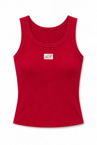 A red sleeveless tank top with a scoop neck, featuring a small white rectangular patch on the center chest with the letters 'M' and 'B' in red script.