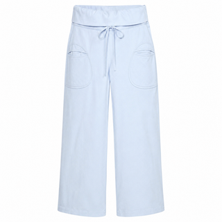 Light blue wide-leg scrub pants with a drawstring waist and large front patch pockets, shown against a plain white background.