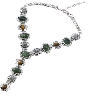 A silver-tone Y-shaped necklace featuring multiple oval green gemstones and smaller brown tiger's eye stones, set in ornate silver frames with clear rhinestone accents, on a plain white background.