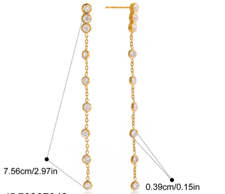 Gold chain earrings with pearl-like beads on a white background
