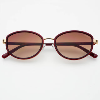 Sunglasses with maroon frames and brown lenses on a white background