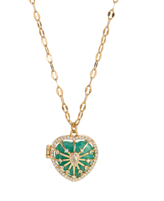 Heart-shaped green pendant on a gold chain against a white background
