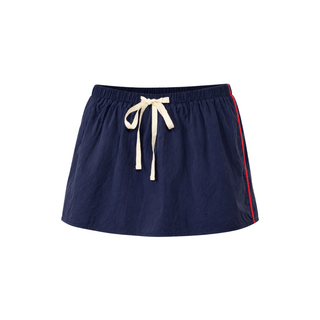A navy blue athletic skirt with an elastic waistband, cream drawstring, and a red stripe detail on the side, shown against a plain white background.